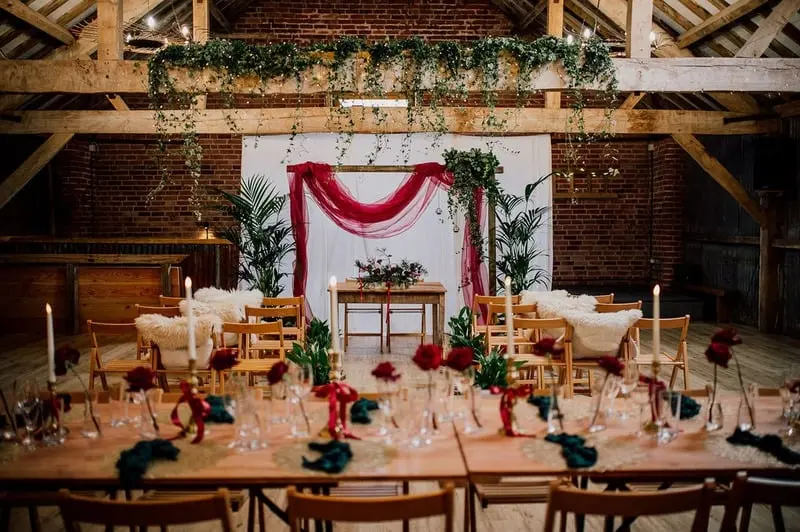 Draped Wedding Ceremony Backdrop with Botanical Styling