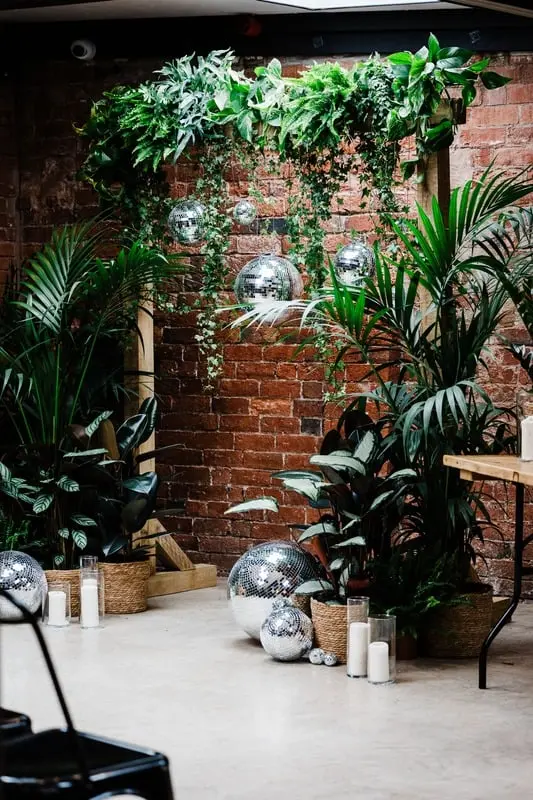 Botanical Wedding Backdrop with Greenery and Candlelight