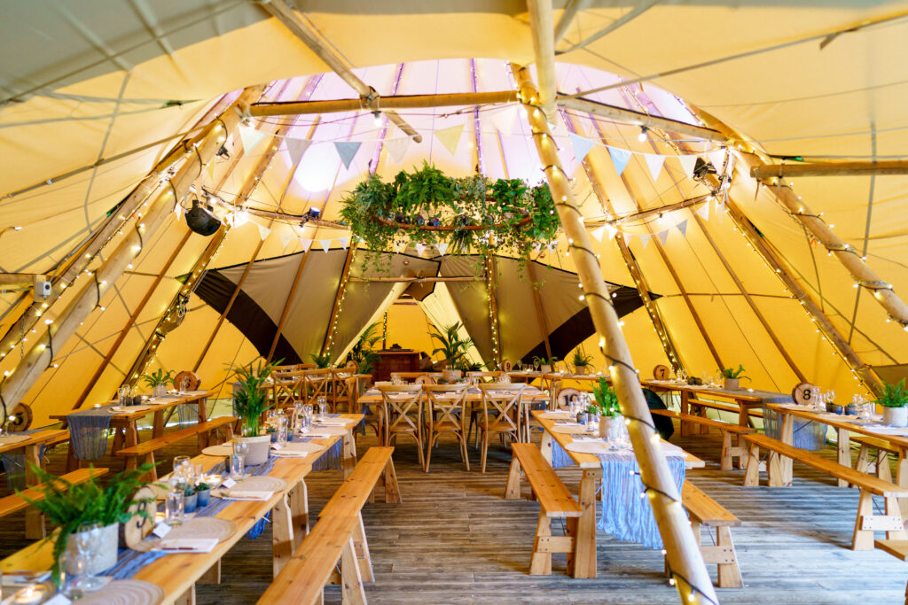 Tipi Wedding Styling with Greenery and Festoon Lighting