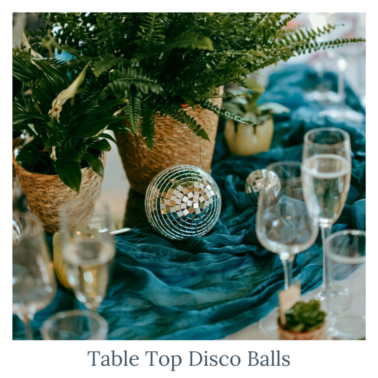 Table top disco balls with greenery for modern wedding table décor