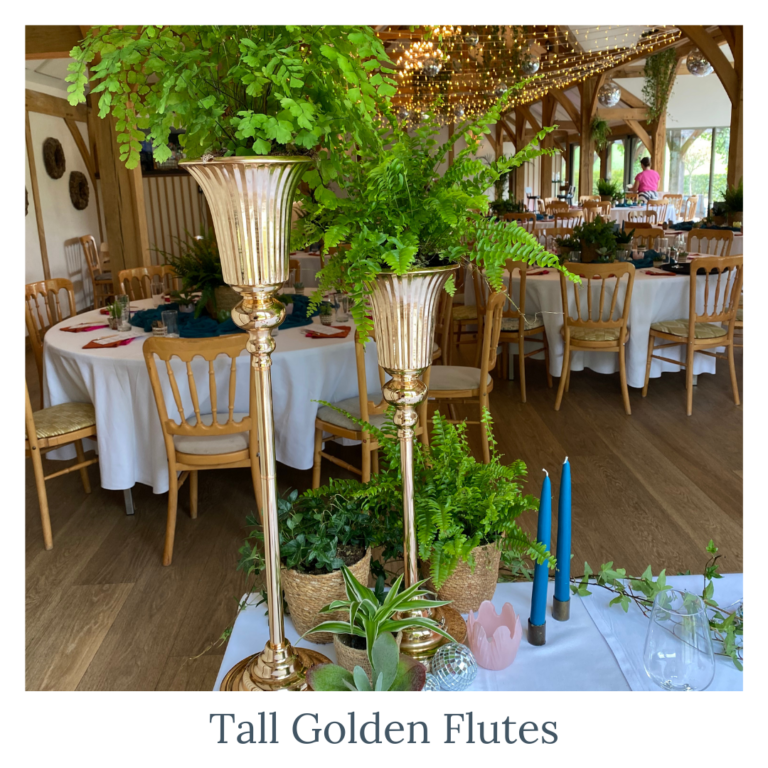 Glass tealight holders with warm candlelight for wedding tables