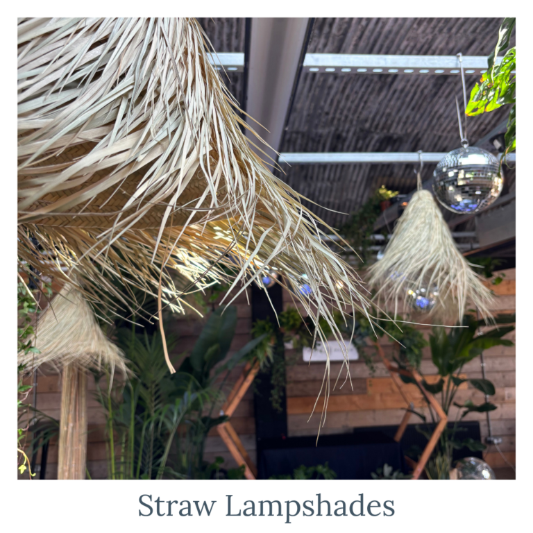 Straw lampshades hanging as rustic wedding décor lighting